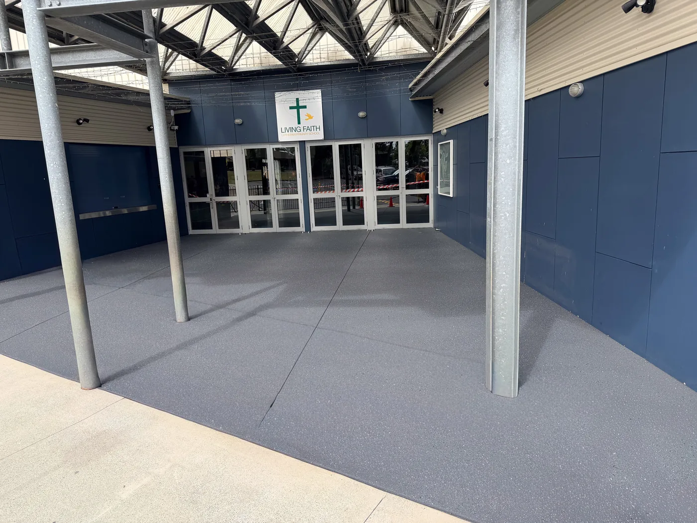 Freshly resurfaced grey anti-slip school entrance at Living Faith Lutheran