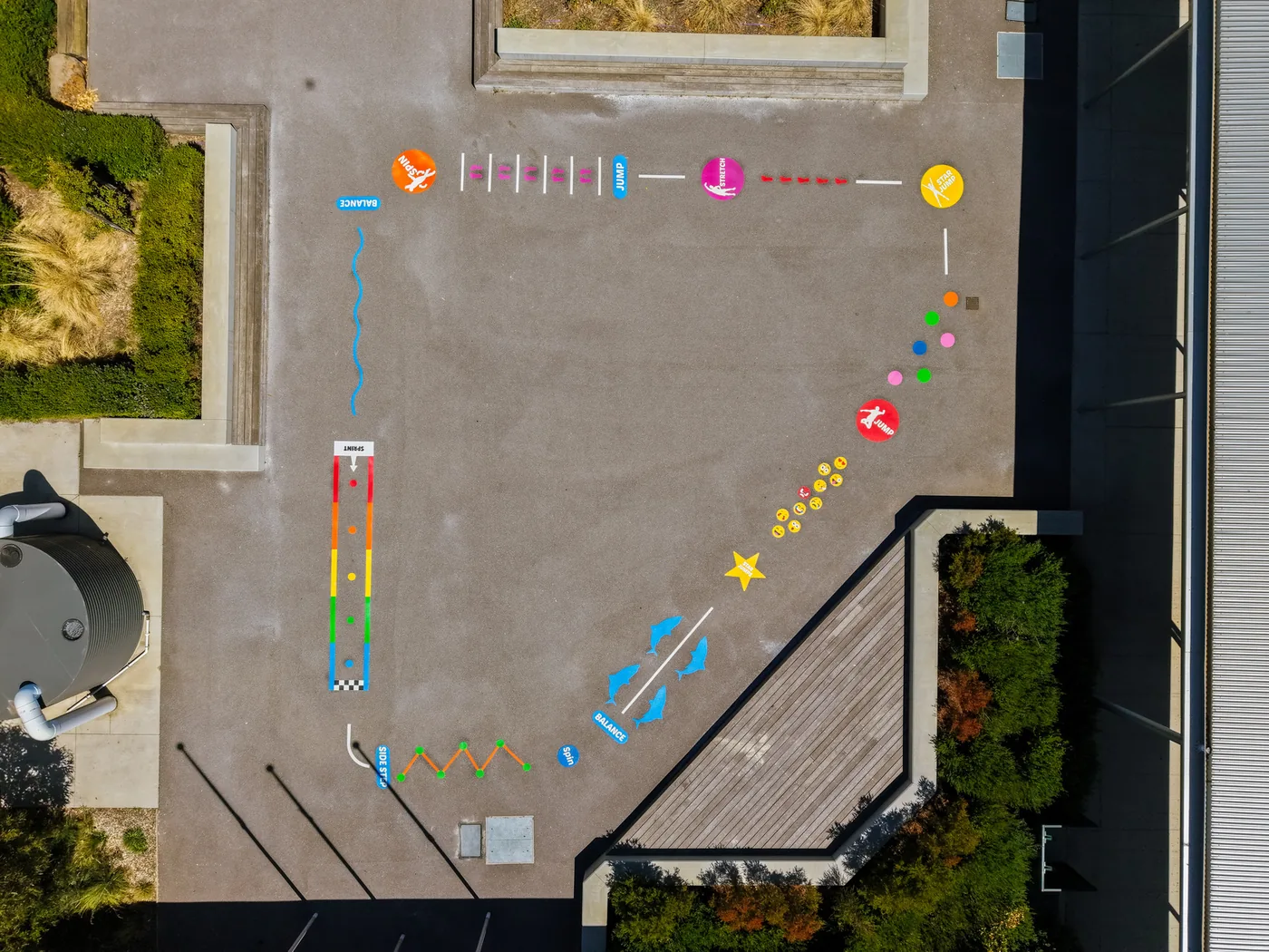 Aerial view of activity markings across a school courtyard